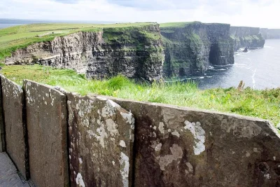 Feel the wild atlantic wind at the cliffs of moher, wander ancient burren landscapes, and enjoy a pub lunch in doolin. includes flexible private guide pickup.