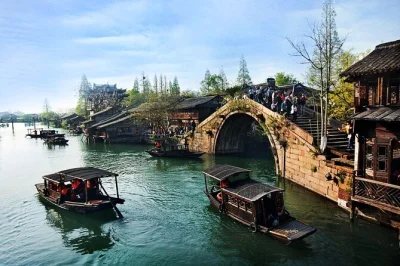 Slip into the slow rhythm of zhujiajiao water town on a half-day trip from shanghai, with private guide, garden entry, boat ride, and local lunch included.