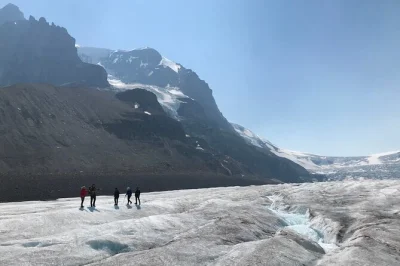 Step onto athabasca glacier with a certified guide, small group, and all gear included. walk across ice, hear glacier stories, and maybe even try ropework—book your spot.
