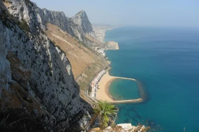 Feel the wind on gibraltar’s upper rock, meet wild monkeys, cross windsor bridge, and explore wwii tunnels with a local guide—includes flexible pacing.