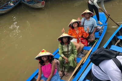 Float through mekong delta canals by sampan, sample coconut candy, and visit vinh trang pagoda. includes pickup, lunch, and local guide from ho chi minh city.