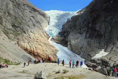 Feel the spray of waterfalls, walk to briksdal glacier from olden, and catch lake views on this shore excursion. includes valley drive, local guide, and flexible walking options.