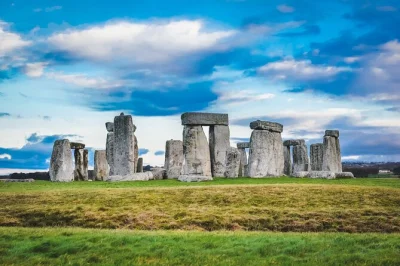 Step from bath into ancient england—stonehenge, avebury stones, cotswold villages—on a small-group day trip with entry fees and guide included.