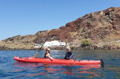 Paddle santorini’s volcanic south coast by kayak, explore sea caves, snorkel at red & white beaches, and share a homemade picnic. small group tour with pickup option.