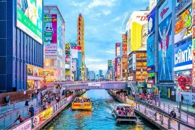 Osaka erleben: geführte tour durch dotonbori, kuromon markt und coole retro-stadtteile – mit lokalem guide, flexibler dauer und snacks inklusive.