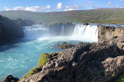 Start your lake myvatn day trip from akureyri port, see godafoss waterfall, explore dimmuborgir lava fields and relax at the myvatn nature baths. includes pickup.