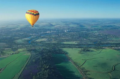 Float above avon valley at sunrise in a hot air balloon, watch the landscape wake up, and enjoy a champagne breakfast after landing. includes pickup and local pilot.