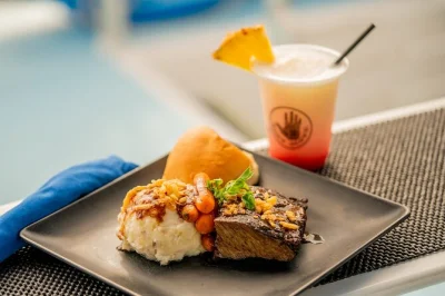 Sail from kona to kealakekua bay for a dinner cruise with live hawaiian music, local stories, and sunset views. includes dinner, drinks, and expert narration.