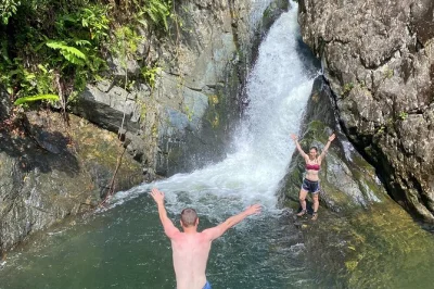 Feel the mud, splash into hidden pools, and laugh with locals on this el yunque rainforest day trip—guided hike, rope swing, and waterslide included. drive yourself.