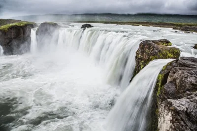 Start your north iceland adventure from akureyri port—see goðafoss waterfall, lake mývatn’s lava fields, and hverir’s steaming mud pools, with pickup and local treats included.