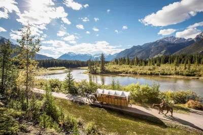 Feel the wild spirit of banff with a covered wagon ride along the bow river, hearty steak cookout, and classic western games. includes meal and local guide.