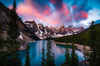 Wake up early for a moraine lake sunrise, warm drinks in hand, and two hours at lake louise. includes cozy blankets, small group pickup from banff or canmore.