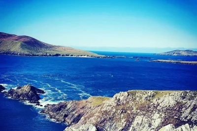 Feel the wind on slea head drive, see gallarus oratory, and watch sheep graze above the atlantic. includes private transport and local insights.