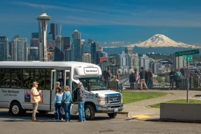 Step onto a mini coach in seattle for a lively city highlights tour. visit pike place market, ballard locks, pioneer square, and enjoy skyline views. includes pickup.