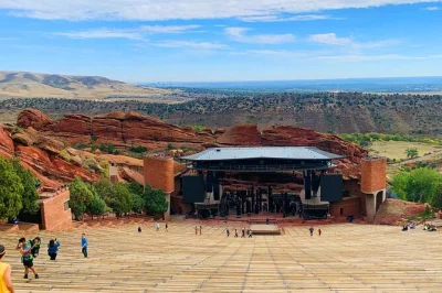 Feel the energy of red rocks amphitheatre, stand atop lookout mountain, and wander golden’s main street—all with a local guide and easy pickup from denver.