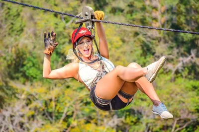 Feel the rush in puerto vallarta with a jungle zipline canopy, speed boat ride, tequila tasting, and riverside lunch. includes round-trip transport options.