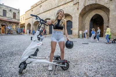 Feel the energy of rhodes as you zip through the medieval city & mandraki harbor on a private trikke scooter tour with a local guide. includes photos & water.