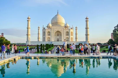 Feel the early morning buzz of delhi, ride to agra for a guided walk through the taj mahal & agra fort, with local lunch and private car pickup included.