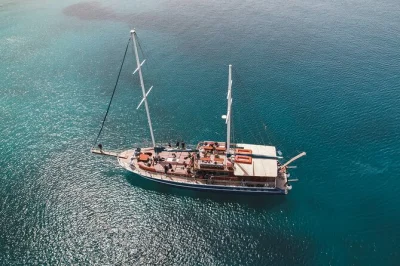 Feel the breeze on a full-day athens cruise to agistri, moni & aegina. swim, eat greek buffet lunch, sip wine, and explore islands—includes pickup & local crew.