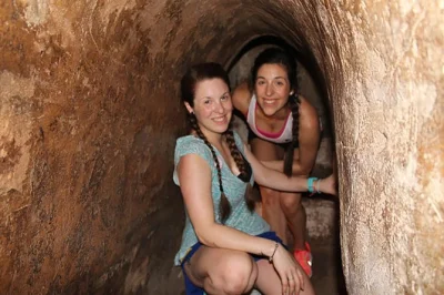 Step into the cu chi tunnels near ho chi minh city, crawl underground, try the shooting range, and enjoy local tea. includes pickup, guide, and entry tickets.