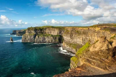 Hear irish music, walk the cliffs of moher, and explore galway on a guided day trip from dublin. includes entry tickets, walking tour, and coach pickup.