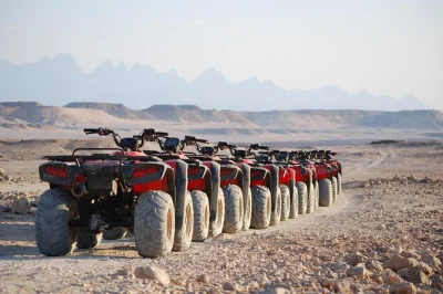 Feel the desert wind on a sunset quad bike safari from el gouna, explore wadi billy’s coral fossils, and share tea with bedouins. includes hotel pickup.