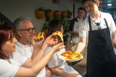 Laugh with local chefs, shape roman pizza dough, and taste your own gelato in a hands-on rome cooking class—includes recipes, wine, and a city center location.