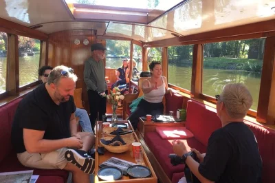 Step aboard a 1928 royal dutch boat for a small group amsterdam canal cruise with open bar, local stories, and flexible routes. includes heated cabin & blankets.