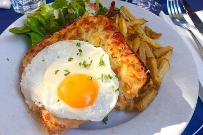 Scopri le marais a parigi con una guida locale, assaggiando croque-madame, macarons, formaggi e molto altro. tutto incluso: cibo, bevande e storie, per un pasto completo in 3 ore.