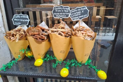 Walk ortigia’s lively market, taste arancini, fried fish, and cannoli with a local guide on this syracuse street food tour—includes snacks, lunch, and drinks.