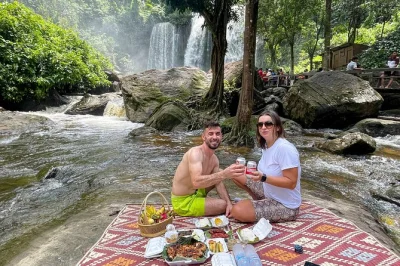Breathe in cambodia’s countryside on a kulen mountain day trip from siem reap. swim beneath waterfalls, see the reclining buddha, and enjoy a picnic lunch with local flavors. includes hotel pickup.