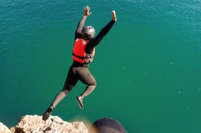 Feel the atlantic on a coasteering day near lagos—cliff jumps, sea caves, wild coastline, marine life. includes wetsuit, helmet, photos and videos.
