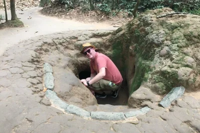 Hear stories from a local guide, crawl through the cu chi tunnels, taste wartime tapioca, and see hidden workshops on this group tour with pickup from ho chi minh city.