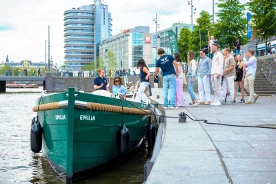 Float past amsterdam’s canal houses, the skinny bridge, and lively neighborhoods on a quiet electric boat with a small group and local skipper. includes drinks option.