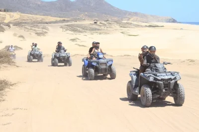 Feel the rush of baja on a los cabos atv adventure from desert to pacific beach, with local guides and a tequila tasting. includes pickup, safety gear, and water.