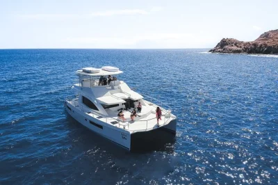 Feel the ocean breeze on a cabo catamaran, snorkel two bays, enjoy lunch and unlimited drinks. includes hotel pickup and all gear for a relaxed half-day at sea.
