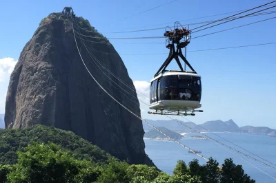Feel rio’s pulse on a half-day tour with christ the redeemer, sugarloaf cable car rides, and city views. includes hotel pickup, guide, and entry options.