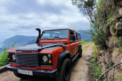 Feel the wild side of madeira on a full-day jeep tour from funchal with natural pools, mountain views, waterfalls, and lunch—includes pickup & local guide.