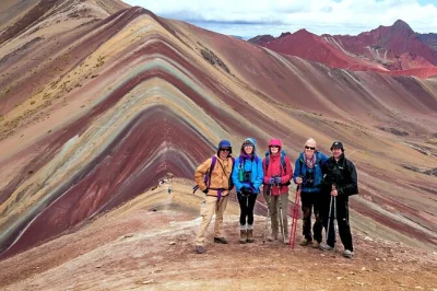 Feel the chill of dawn on rainbow mountain, hike red valley’s wild colors, and share a real andean breakfast—all with early access and hotel pickup from cusco.