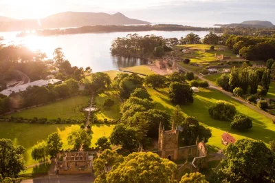 Step into tasmania’s convict past at port arthur, taste chocolate, wander lavender fields, and cruise the harbour—all with easy hobart pickup included.