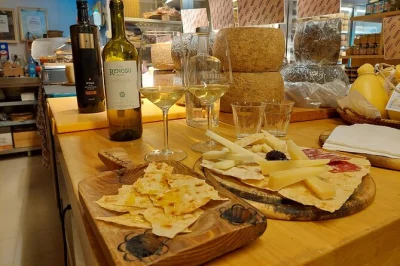 Follow the scent of fresh bread through cagliari’s old streets, sample sardinian pastries, enjoy a full meal with wine, and end with espresso—all included.