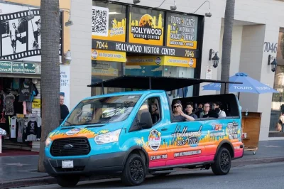 Feel the buzz of hollywood, cruise beverly hills, and spot celebrity homes on an open air bus tour with a lively local guide. includes photo stops and pickup.