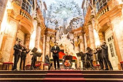 Feel the echo of vivaldi’s four seasons in vienna’s karlskirche, with live baroque instruments and entry ticket included. arrive early for best seats.