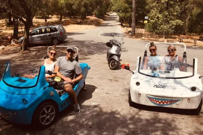 Race the sea breeze from nice to eze in a scoot coupe, tour fragonard perfumery, and circle cap ferrat with swim or drink stops—private guide and pickup included.