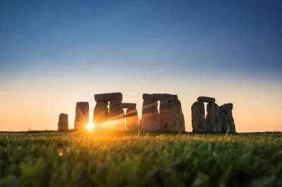 Feel the ancient mystery of stonehenge and wander windsor castle’s royal halls on a day trip from london. includes entry tickets, expert guide, and coach pickup.