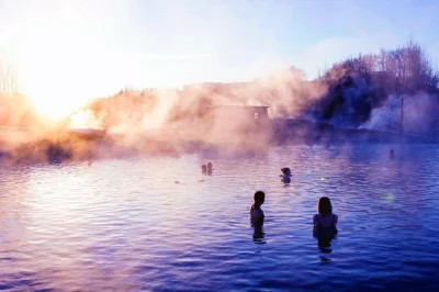 Soak in the secret lagoon, watch strokkur erupt, and walk between continents at thingvellir. includes guided transport from reykjavik and lagoon entry.