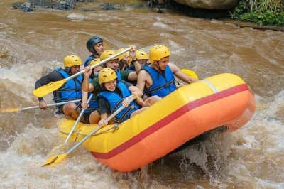 Feel the rush of ayung river rafting in ubud, paddle past lush jungle, and share a riverside lunch. includes hotel pickup, safety gear, and local guide.
