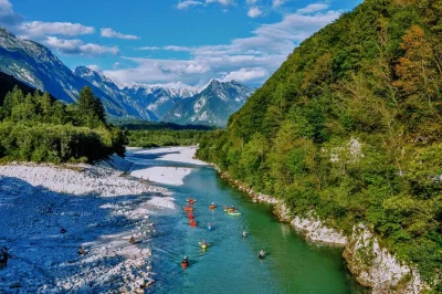 Paddle the emerald soča river from Čezsoča to boka waterfall, guided by locals. includes transport, pro gear, showers, and same-day photos. book for small groups.
