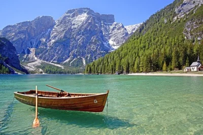 Wake up in venice, then wander cortina d’ampezzo, circle lake braies, and soak in dolomite peaks—all with easy van transport and a local guide. includes pickup.