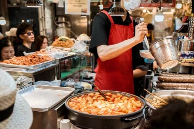 Sample 12 korean street foods in seoul’s lively markets, explore a hanok village, and enjoy cafe drinks on this small group tour with all tastings included.